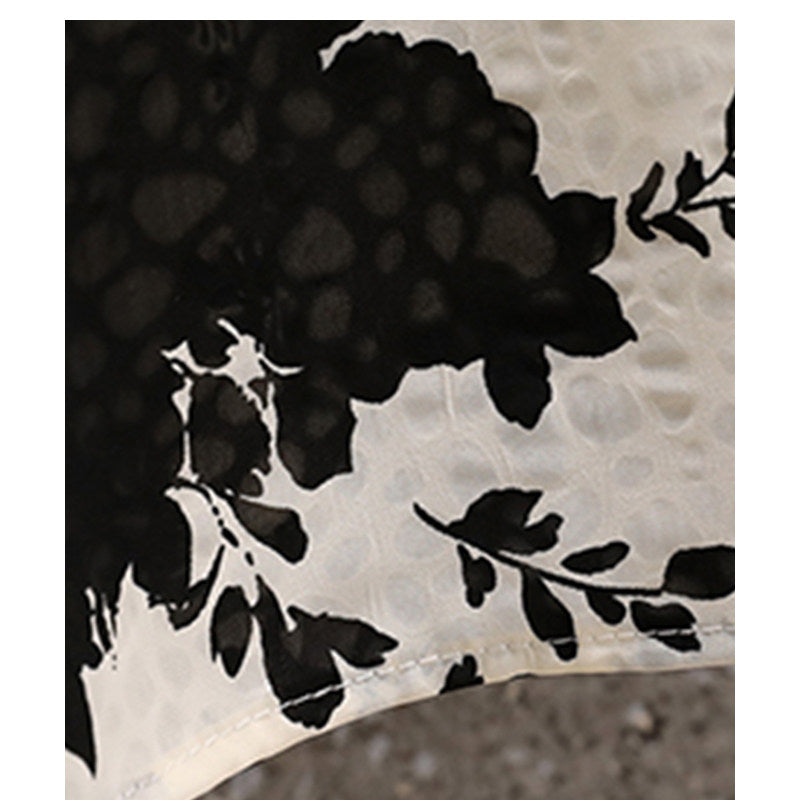 CaraCLUB large size floral short-sleeved dress women's new summer fat sister covers the flesh and slims down the design skirt