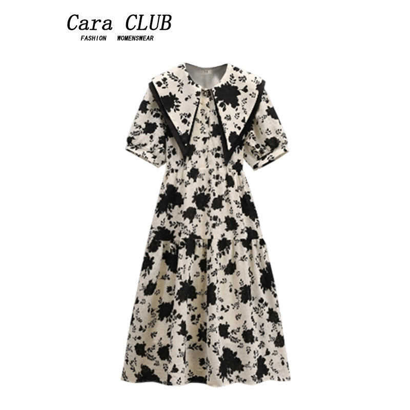 CaraCLUB large size floral short-sleeved dress women's new summer fat sister covers the flesh and slims down the design skirt